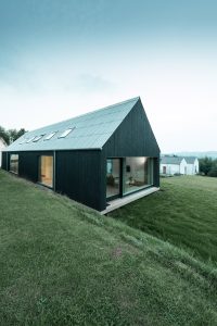 Wohnhaus Ottweiler: Holzbau mit Eternit Wellplatten