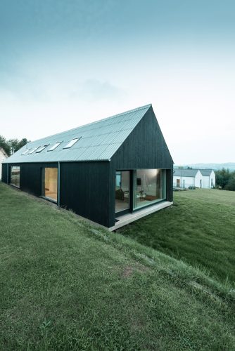 Wohnhaus Ottweiler: Holzbau mit Eternit Wellplatten